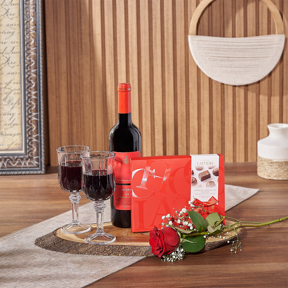 Assorted holiday gift baskets and flowers
